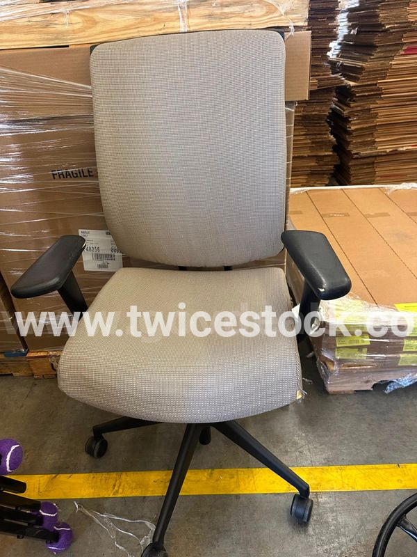 A tall beige chair